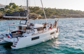 3_guests_on_board_lagoon_40_samana Luxury Property for Sale | Exclusive Villas & Estates | 1UK  Meta Description (&le;160 chars): - Lagoon 40 Samana | Luxury Family Catamaran Charter Sicily